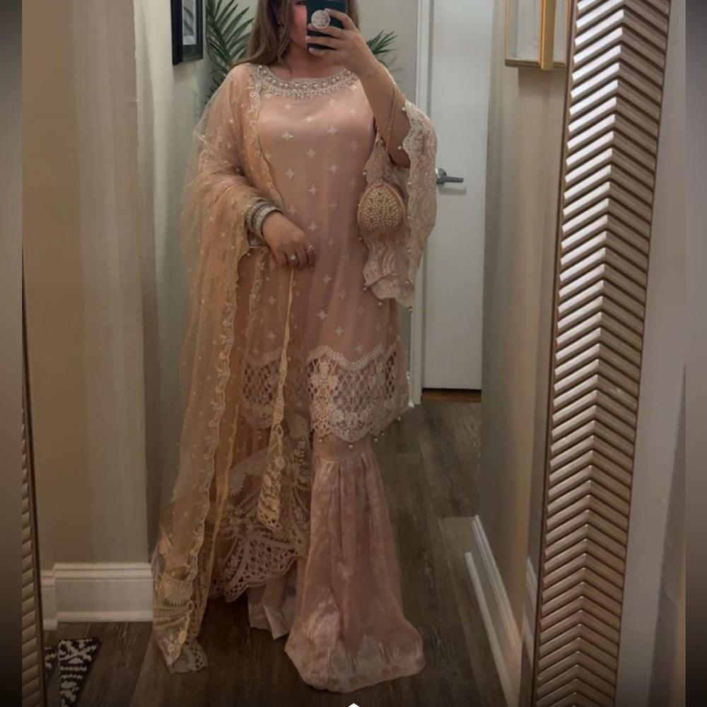 Elegant Pakistani Peach Embroidered Dress with Lace Details